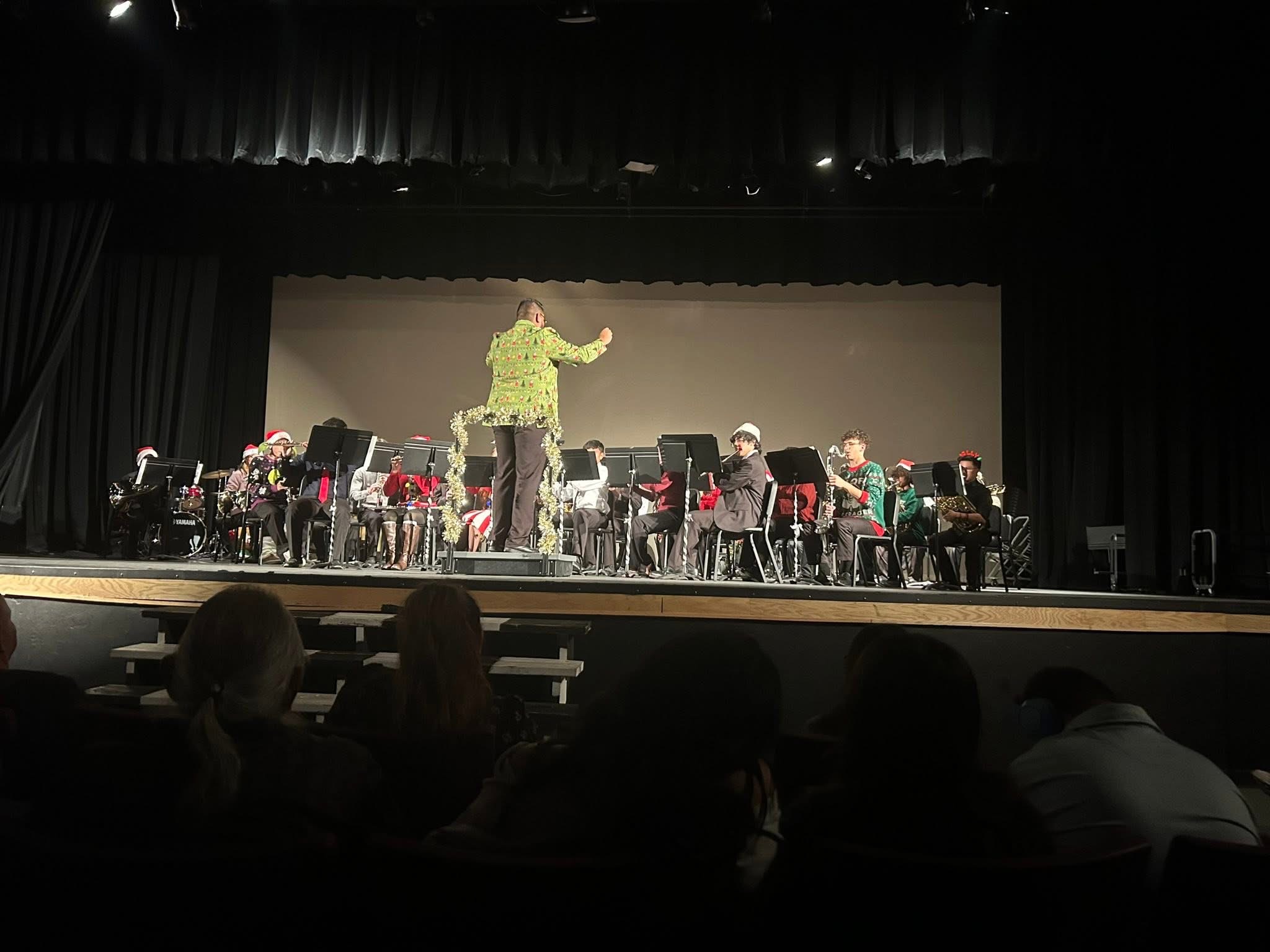 Director conducting holiday concert